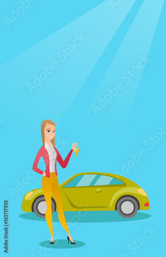 Woman holding keys to her new car.