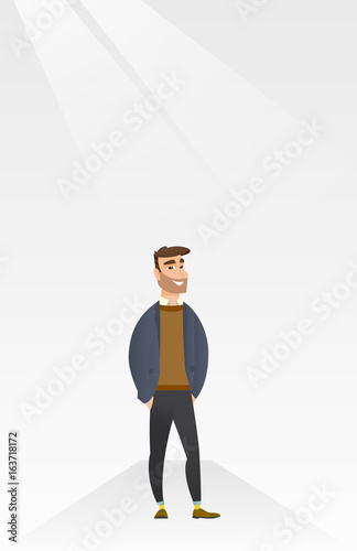 Man posing on catwalk during fashion show.