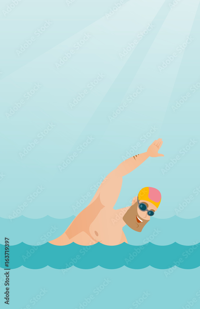 Young caucasian sportsman swimming.