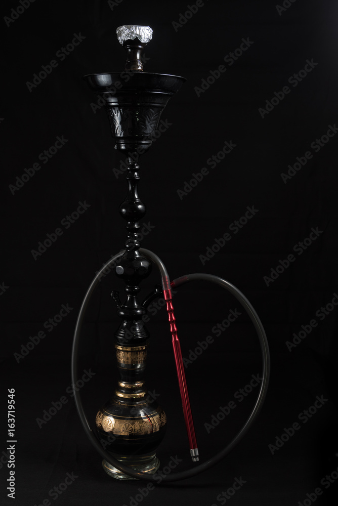Hookah pipes used to smoke shisha/tobacco. Nightlight and Hookah Bars Hookah pipes used to smoke shisha/tobacco. Nightlight and Hookah Bars