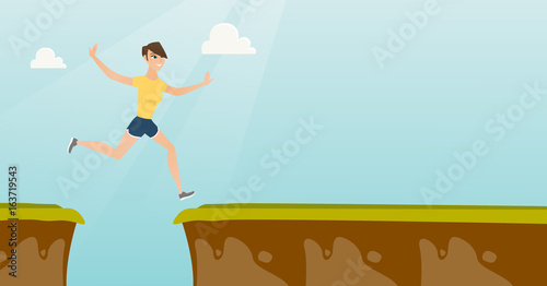 Young caucasian sportswoman jumping over the cliff