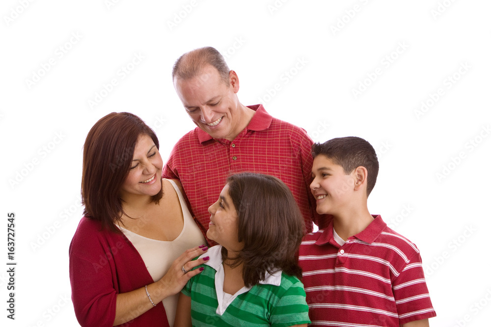 Hispanic family smiling isolated on white. Hispanic family smiling isolated on white.