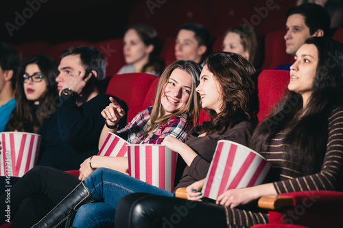 Two friends in the cinema on comedy