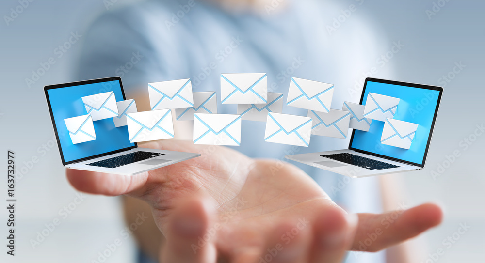 Businessman receiving e-mails on his digital devices 3D rendering Businessman receiving e-mails on his digital devices 3D rendering