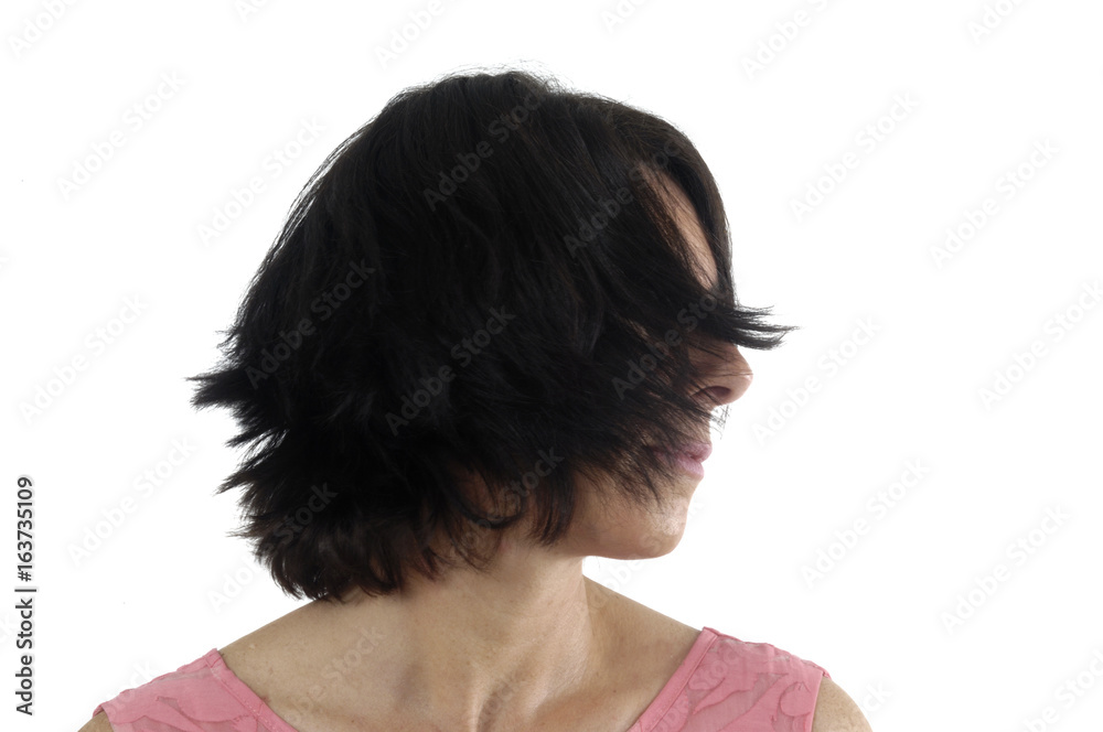 A woman moving her head on white background
