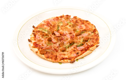 Delicious pizza inside dish isolated