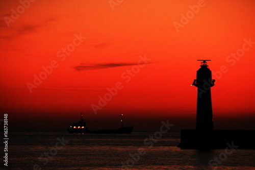 The lighthouse in a sunset