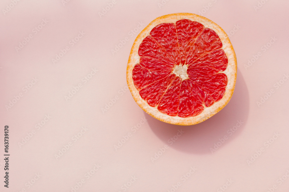 Fashion. Tropical Fresh Summer Set. Fashion Design. Fruit Citrus. Red Grapefruit. Bright Color. Creative Art. Minimal. Fashion Top View. Summer Beach Concept. Pink background. Fashion. Tropical Fresh Summer Set. Fashion Design. Fruit Citrus. Red Grapefruit. Bright Color. Creative Art. Minimal. Fashion Top View. Summer Beach Concept. Pink background.