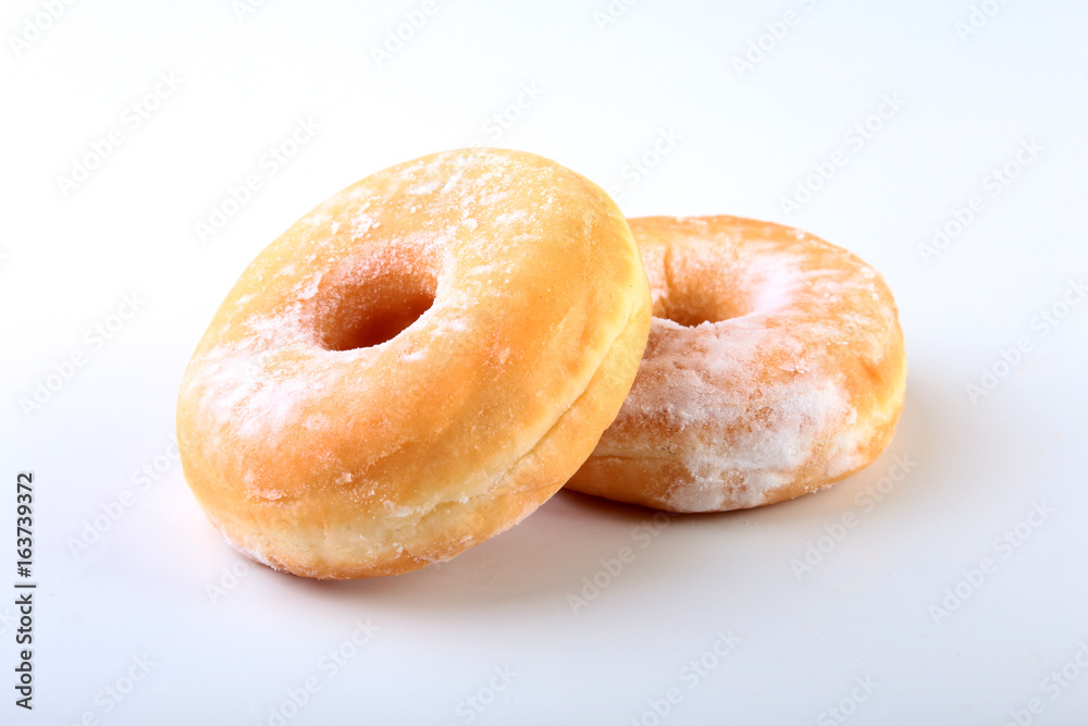 Homemade Doughnuts with Jelly filled and powdered sugar isolated on white background. Selective focus.