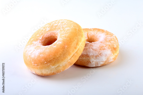 Homemade Doughnuts with Jelly filled and powdered sugar isolated on white background. Selective focus.
