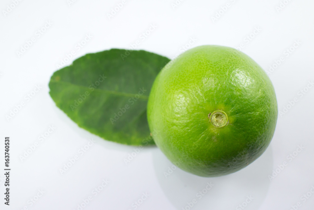 lemon and green leaf isolated on white background lemon and green leaf isolated on white background