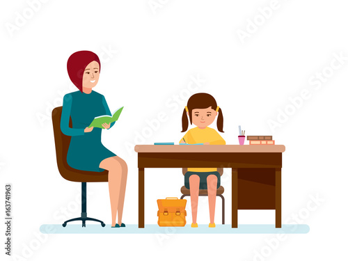 Mom checks homework of daughter, girl does lessons at table.