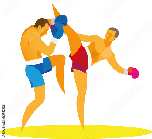 Two young kickboxers are holding a heavy fight