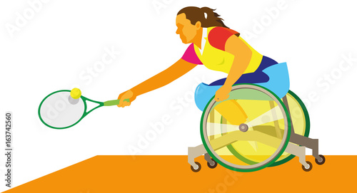 A disabled woman in a wheelchair play in tennis
