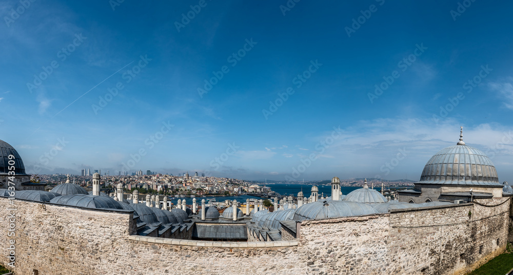 ISTANBUL, TURKEY - MAY 05, 2017:Panoramic View of galata tower from roof of  Buyuk Valide Han an old Ottoman inn that accommodated traveling merchants over 350 years ago