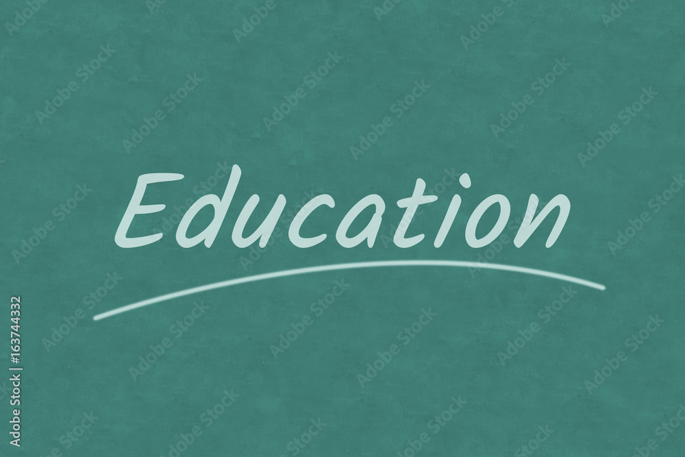 Obraz premium Education wording on classroom blackboard