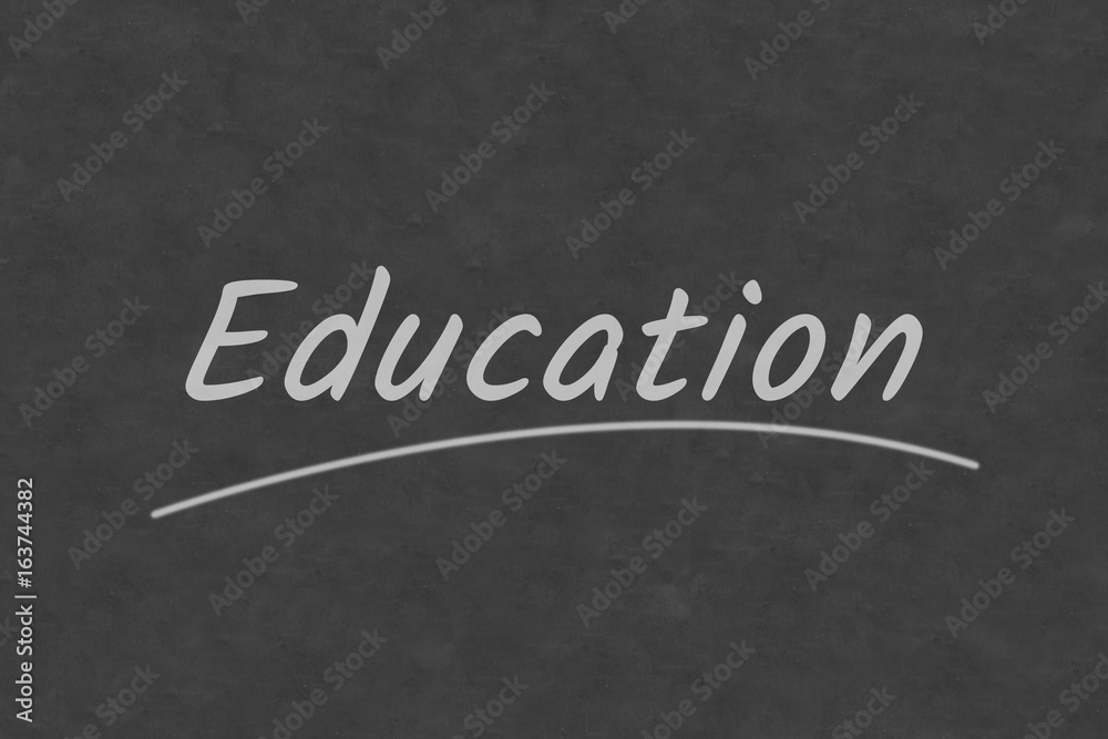 Obraz premium Education wording on classroom blackboard