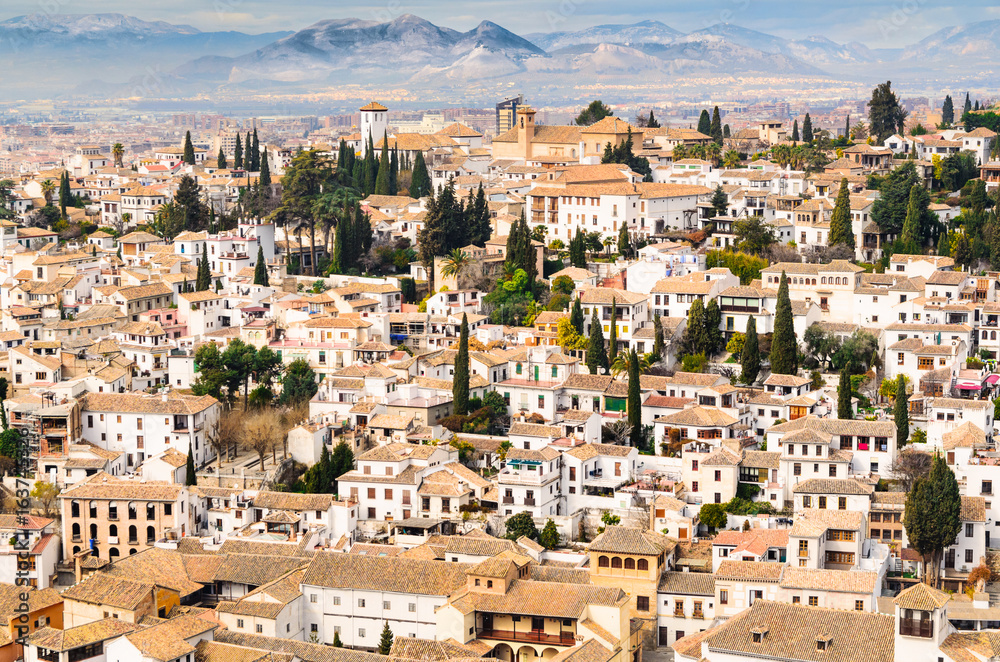 Panoramic view of Granada city against mountains, Andalusia, Spain