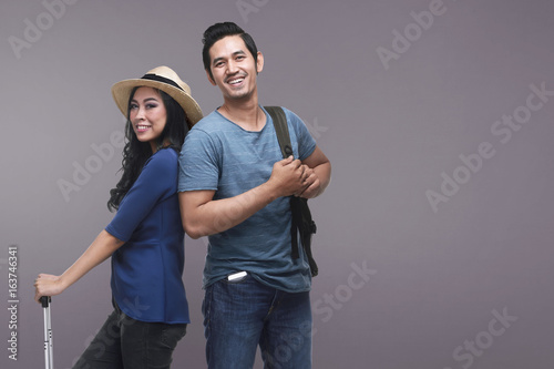 Traveler asian couple with happy expression