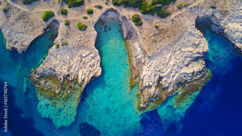 Aerial drone photo of famous caves near Pori beach, Koufonissi island. Cyclades, Greece photo