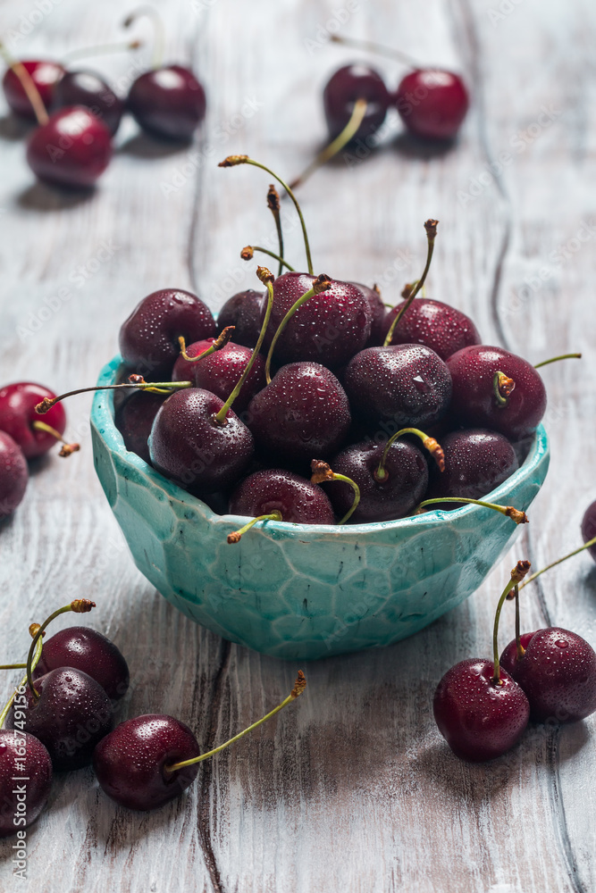 Cherries in a bowl with water drops Cherries in a bowl with water drops