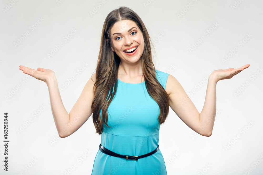 Smiling woman in blue dress presenting empty hands. Smiling woman in blue dress presenting empty hands.