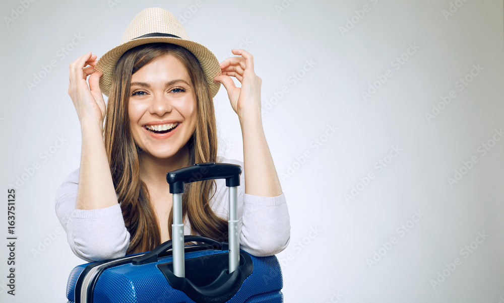 Portrait of smiling woman before traveling. Portrait of smiling woman before traveling.
