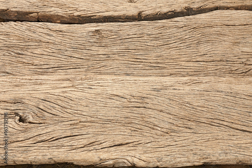 Close-up pattern of sun-dried African Acacia old wooden board photo
