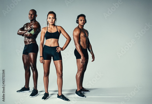 Healthy young men and woman with muscular build