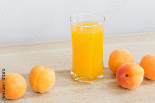 peach juice on wooden table