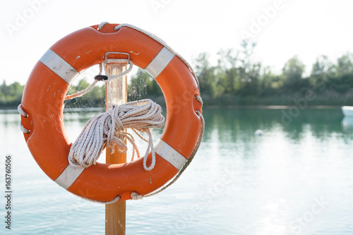 Lifesaver ring, beside lake, close-up