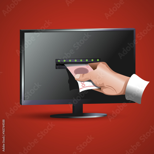 Hand takes the money at the monitor