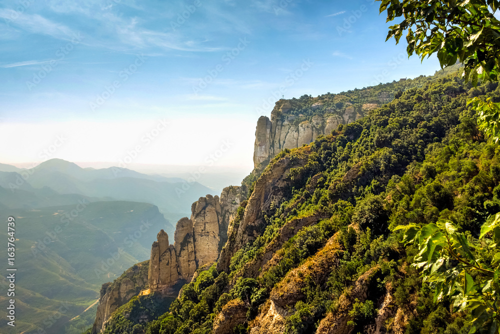 Naklejka premium Montserrat green rocks near the Montserrat abbey, Catalonia
