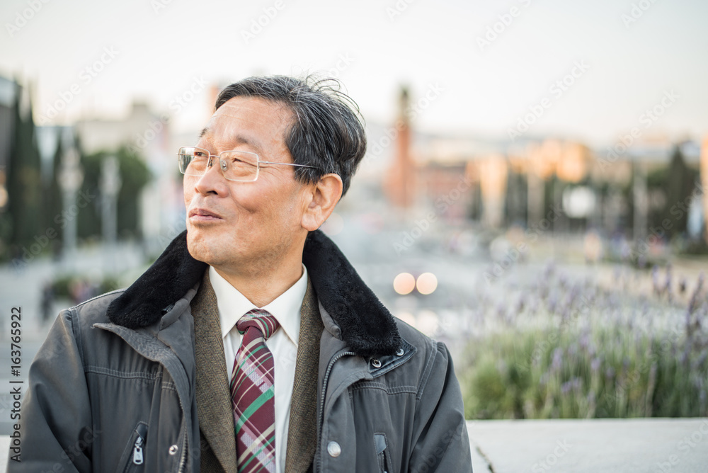 Japanese senior old man outdoors smiling and happy portrait Japanese senior old man outdoors smiling and happy portrait