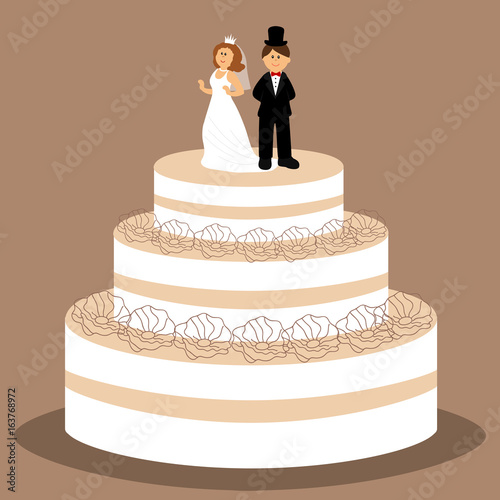 Wedding cake with bride and groom figurine.