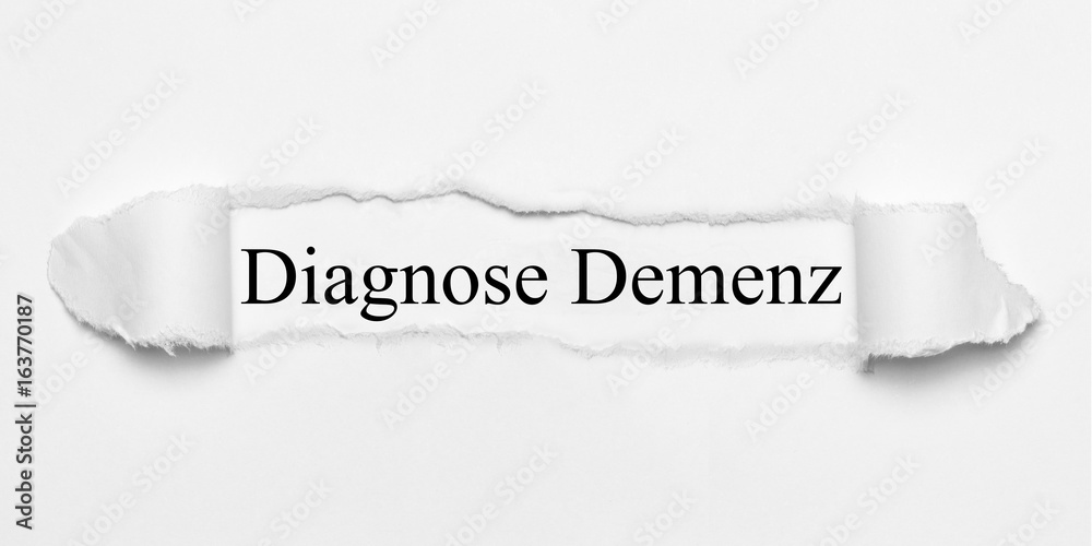 Obraz premium Diagnose Demenz auf weißen gerissenen Papier