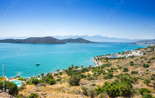 Fototapeta Naklejka Na Ścianę i Meble -  Panoramic view of the town Elounda, Crete, Greece.Paradice view of Crete island with blue water. Panoramic view of Elounda nature
