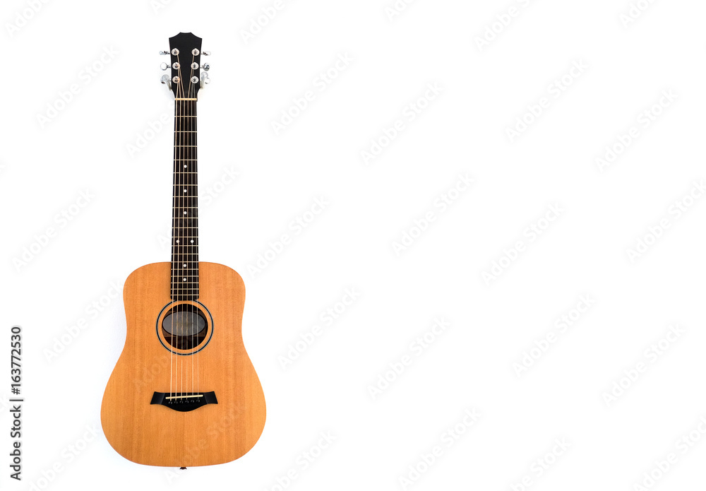 Naklejka premium Guitar on a white wall.