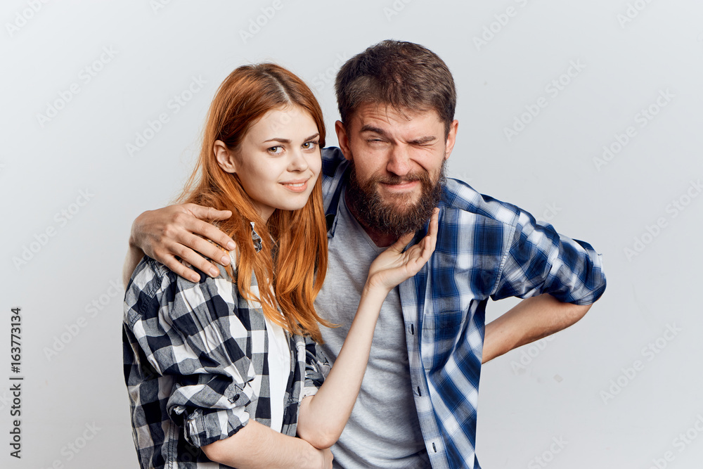 Young guy with a beautiful woman on white isolated background, repair Young guy with a beautiful woman on white isolated background, repair