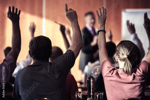 Large group of seminar audience in class room