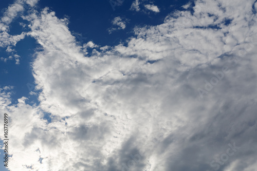 stratocumulus clouds and the dark blue sky photo