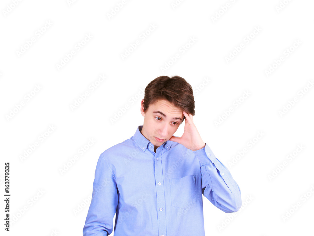 Portrait of young man thinking. Teen boy, isolated on white background Portrait of young man thinking. Teen boy, isolated on white background