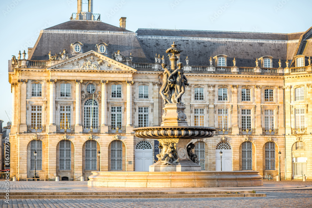 View on the famous La Bourse square with fountain during the morning in Bordeaux city, France