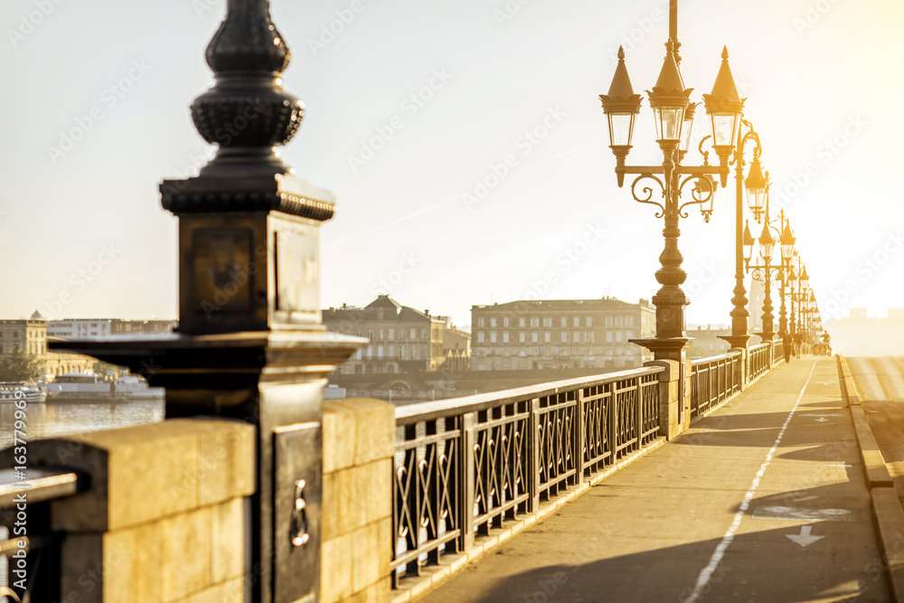 Beautiful view on the famous saint Pierre bridge during the morning light in Bordeaux city, France