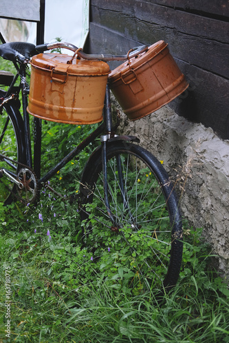 Vintage bicycle with film reels in cinema boxes