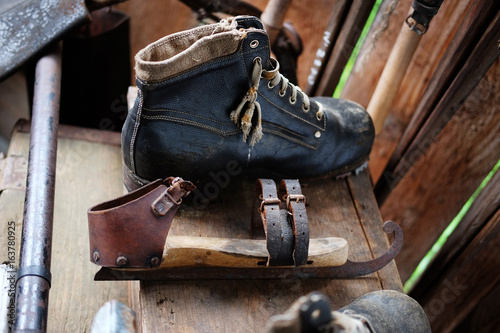 Vintage hiking boots and figure skates
