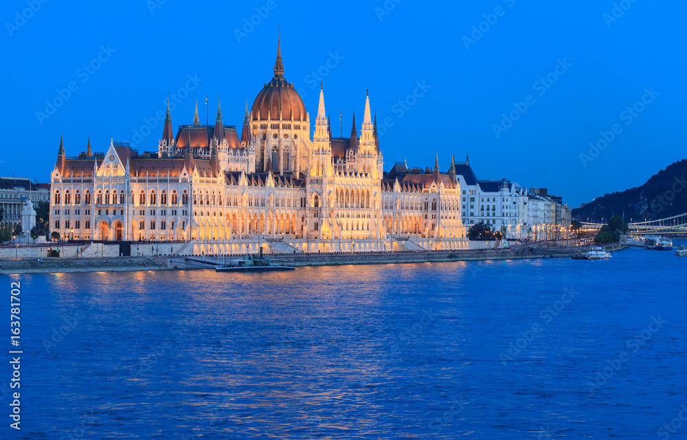 Evening view on  Hungarian Parliament and Danube river,  Budapest, Hungary 
