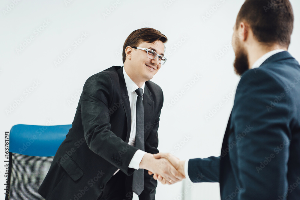 Business partners shaking hands for cooperation concept Business partners shaking hands for cooperation concept