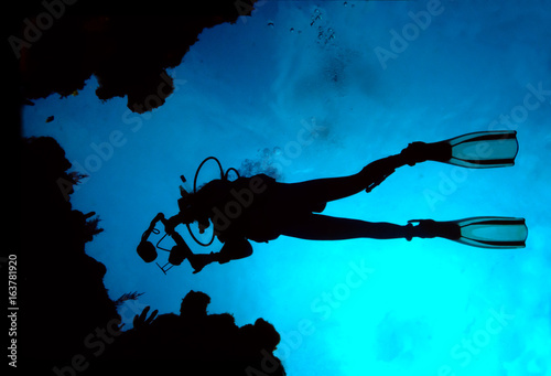 Diver with camera underwater