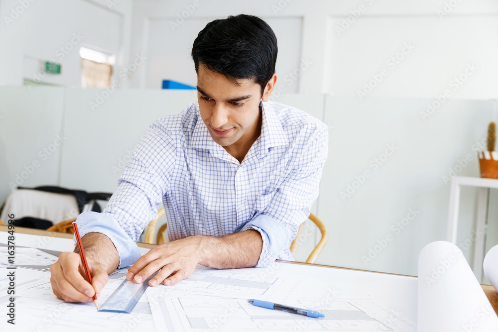 Young man architect in office Young man architect in office